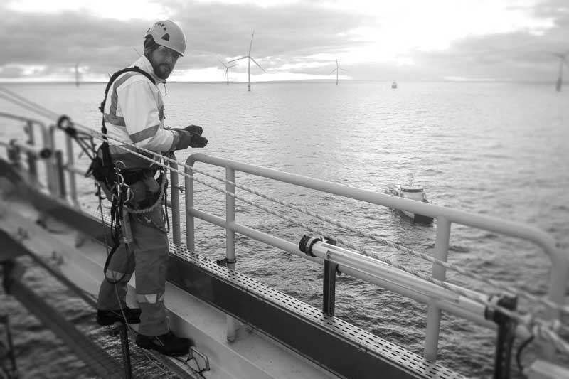 engineer-surveying-offshore-wind-turbine