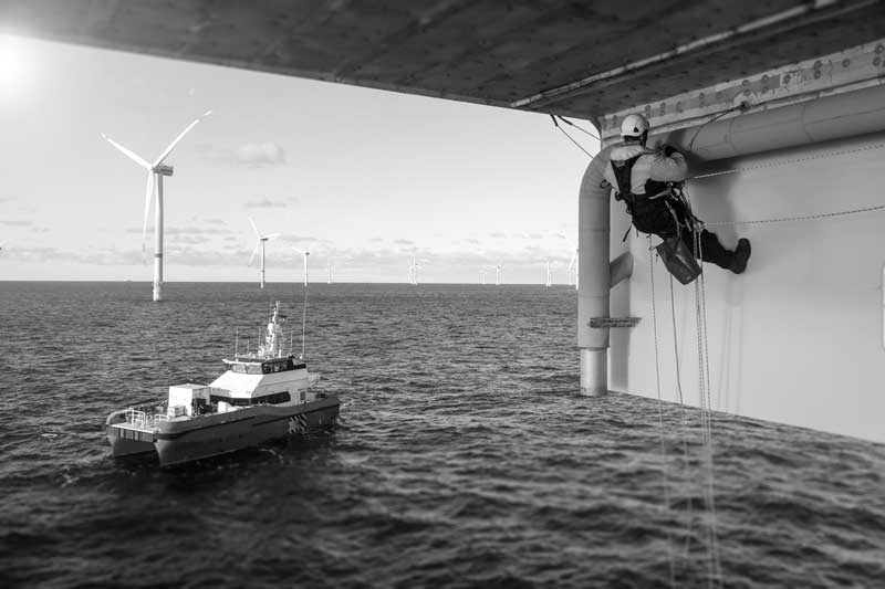 engineer-fixing-turbine-at-sea