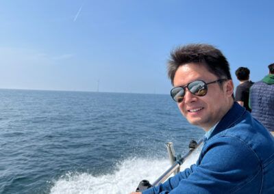 Aaron looking out from the boat at Rampion Offshore Wind Farm